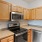 Well-lit kitchen with ample counter space