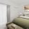 Bedroom with natural lighting and high ceilings